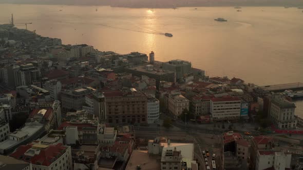 Early Morning Golden Light Above Istandbul, Sunrise Over the Bosphorus From an Aerial Tilt Up alt