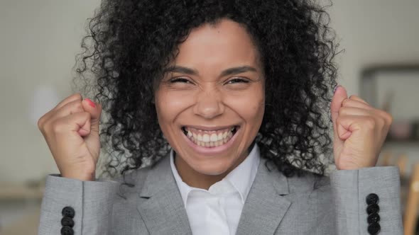 Success African Businesswoman Celebrating Results alt