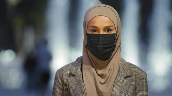 Closeup Female Face in Medical Mask in City alt