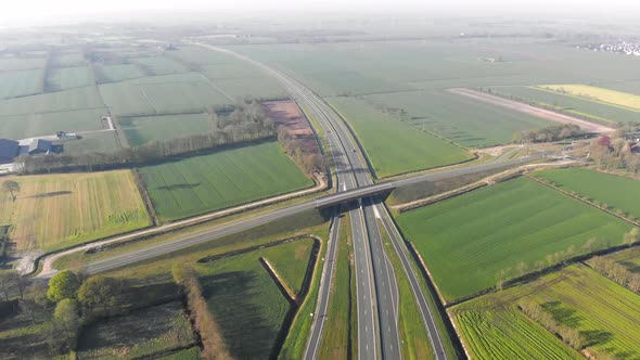 Aerial Top View of the Motorway, Interchange Between the Motorway and the City alt