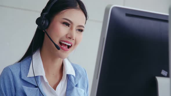 Customer Support Agent or Call Center with Headset Talking to Customer on Phone alt