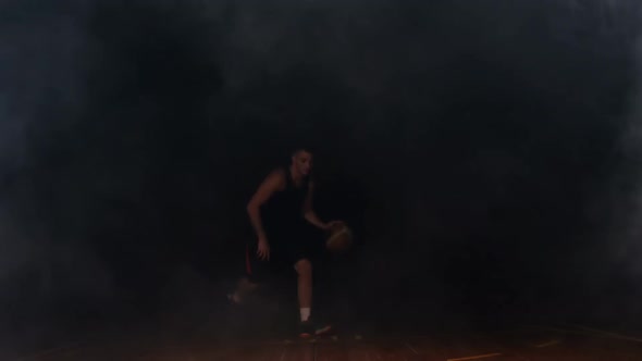 Sportsman playing basketball alt