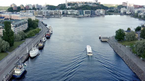 Stockholm, Sweden. Aerial Drone hovering still with a summer view of a lake and bay alt