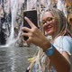 Cute Female Using Smartphone Take Selfie in City Public Park - VideoHive Item for Sale