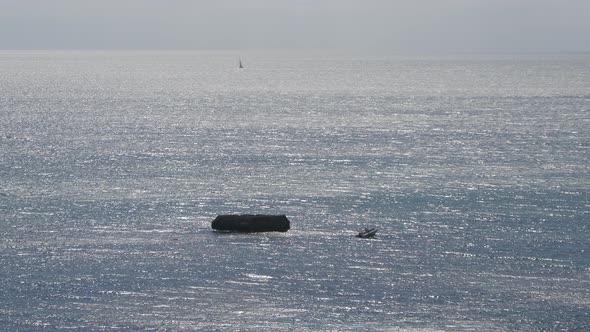 High angle of a boat floating in the sea water alt