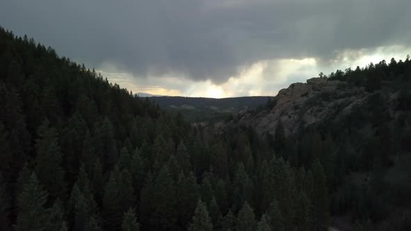 Aerial View of Storm Clouds Looming in the Distance in the Mountains of Colorado, Forward Motion alt