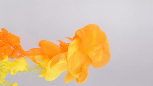 Liquid Abstractions the Dissolution of Red and Yellow Paint in Water alt