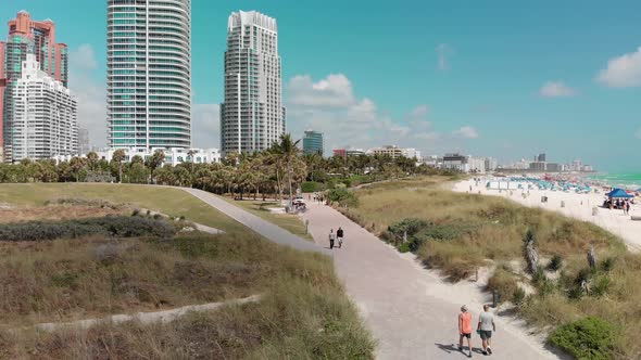 Miami Beach From South Pointe Park Slow Motion Aerial View on a Beautiful Sunny Day alt