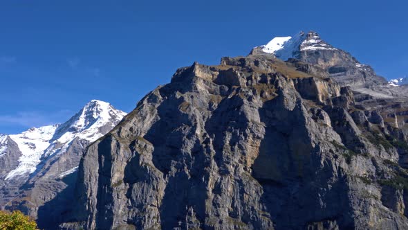 Eiger, Monk And Jungfrau Mountains In Alps As Seen From Murren Village, Berner Oberland, Switzerland