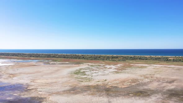 Aerial photography of the Black Sea in Anapa. Shooting a shallow bay in sunny weather.