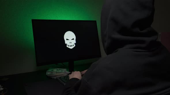 Computer Hacker Typing Code on Keyboard Late Night Working and Bypassing Cyber Security alt