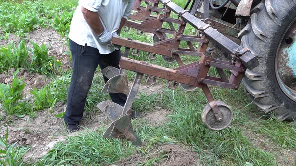 Agricultural Work on a Tractor Mechanized Potato Processing Potato Plowing
