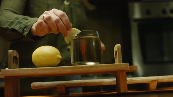 I Put Slices of Lemon on the Glass of Juice alt