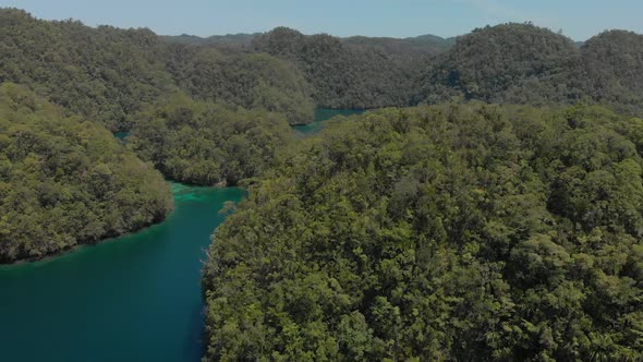 Beautiful aerial drone shot above sohoton natural park in siargao island the philippines. Little tro alt