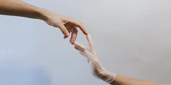 Two medical doctor hands in gloves davinchi art shape over white background, concept video