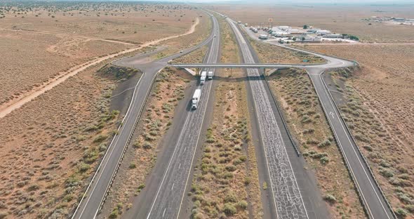 Aerial Scenery Top View of Rest Area with Large Car Park Near Asphalt Interstate Roadside Crossing alt