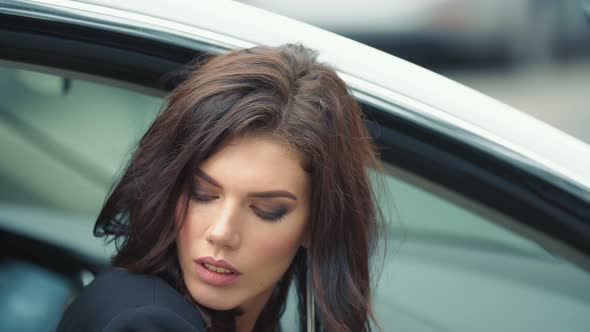 Girl Sitting in Cars