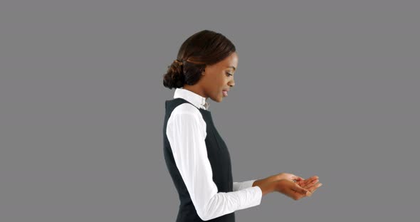 Businesswoman holding something in her hands