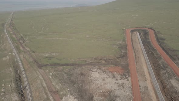Moving along railroad tracks. Aerial view of Railroad emergency stop track in Trialeti, Georgia alt