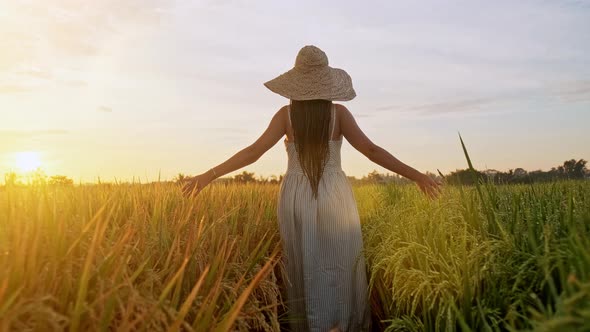 Sensual Young Woman in White Dress Enjoying in Violet Lavender Filed at Beautiful Summer Sunset alt