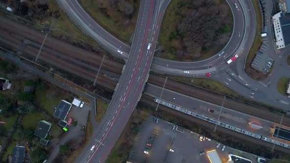 Spinning Drone Shot Flying Down Over Crossing Roads