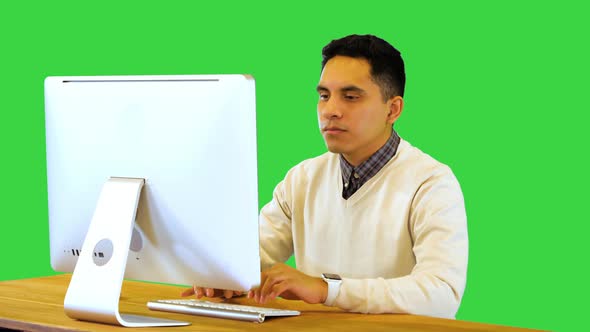 Young Hispanic Man Work on Computer Typing Email or Web Developer Programming Application or Website