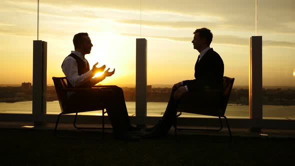 Two Male Entrepreneurs Meeting Together Talking About Business Ideas alt