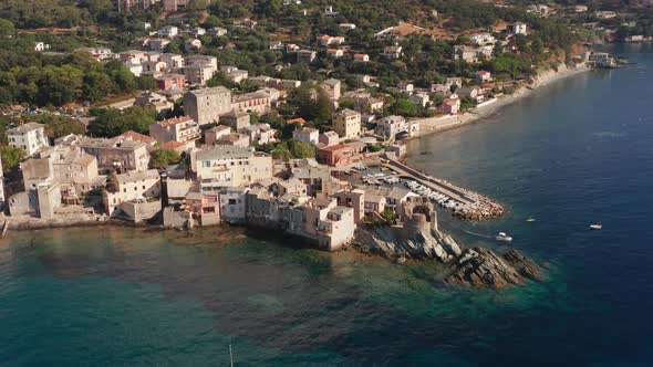 Aerial View of Characteristic Stone Village Port in Corsica alt