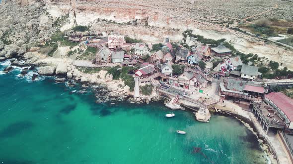 Aerial View of Popeye Village in Anchor Bay From Drone in Mellieha Malta alt