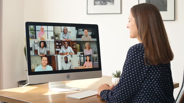 Woman Using Computer App for Video Connection alt