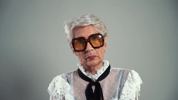 Happy elegant grandmother alt