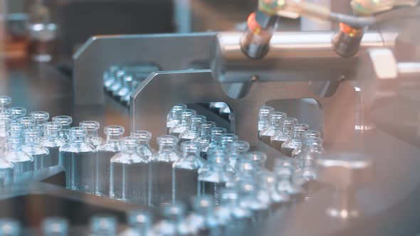 Medical Vials on the Automatic Production Line of Vaccines and Injections. Coronavirus alt