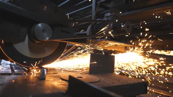 Close Up of Saw Cutting Machine Cut Metal alt