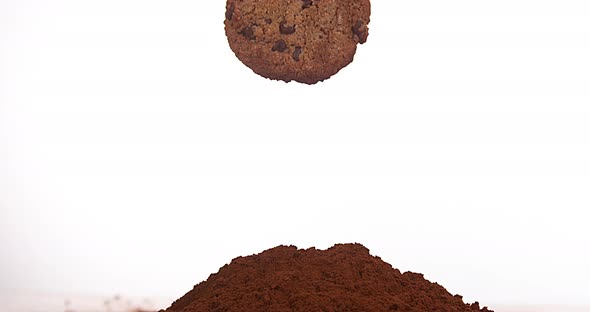 Cookie falling into Black Powder Chocolate, Slow Motion 4K alt