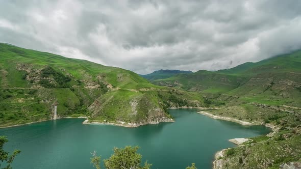 Turquoise Water of Gizhgit Lake in KabardinoBalkaria Russia on Cloudy Day