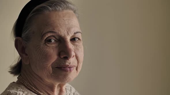 Portrait of a Happy Old Woman alt