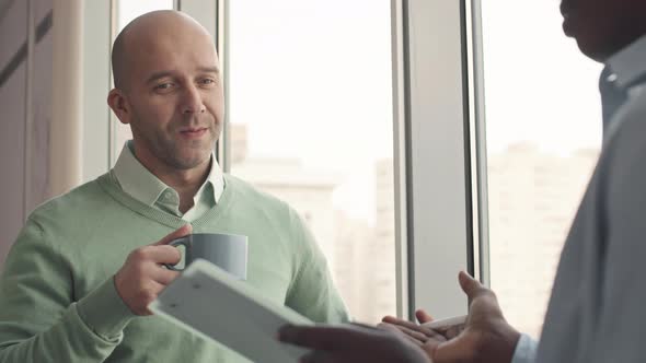 Office Workers Checking Plan alt