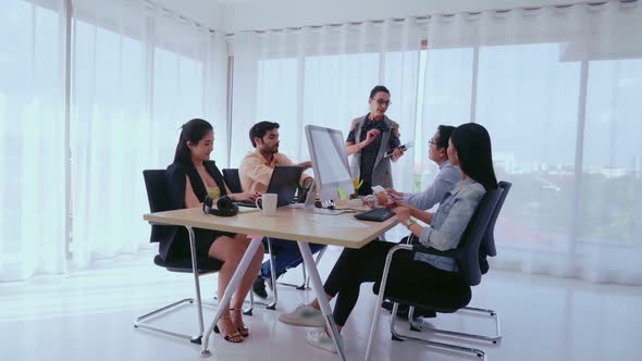 Senior Leader Giving Advice Speech to Team Members alt