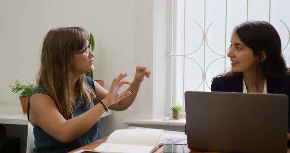 Millennial creative professionals working in a creative office alt