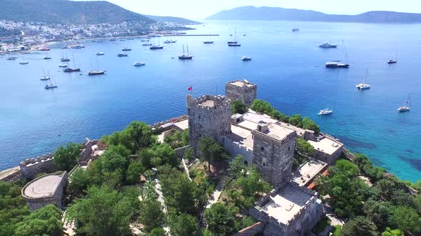 Yachts in Bodrum City Castle and Aegean Sea Bay in Anatolia Turkey  alt