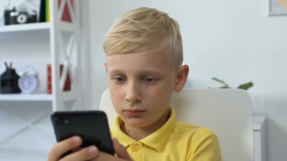 Little Boy Using Smartphone at Home, Gadget Addiction, Technology Influence