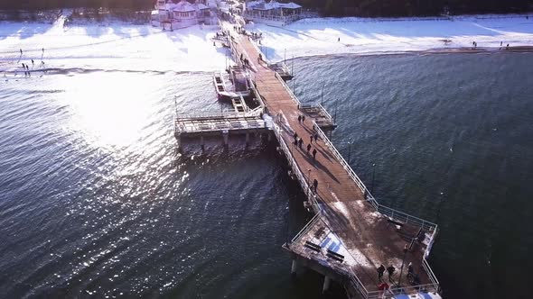 Wooden Pier and Beach  in Gdansk Poland Winter 2021 Aerial Shot