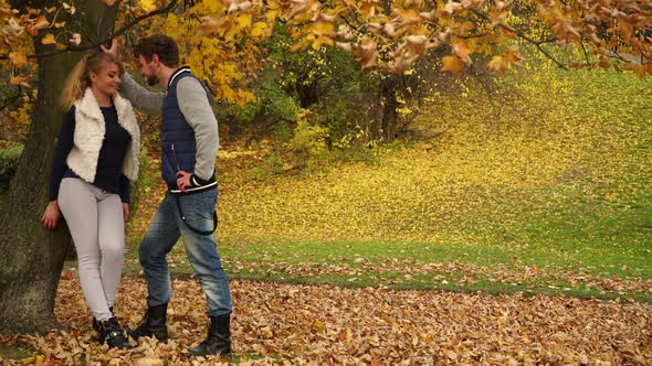 Couple Romantic Date in Autumn Park 