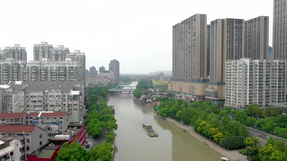 Flying Above River In China City