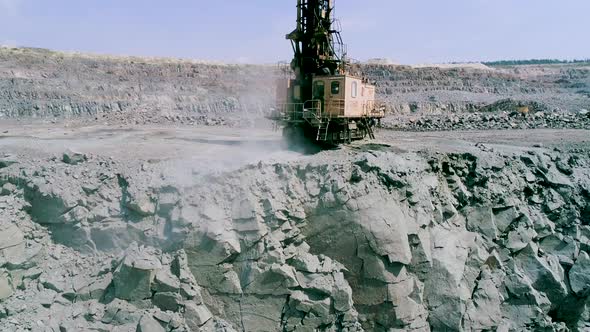 Drilling Rig Drills Granite for Stowing Explosives Slow Motion Industrial Extracting Rock or alt