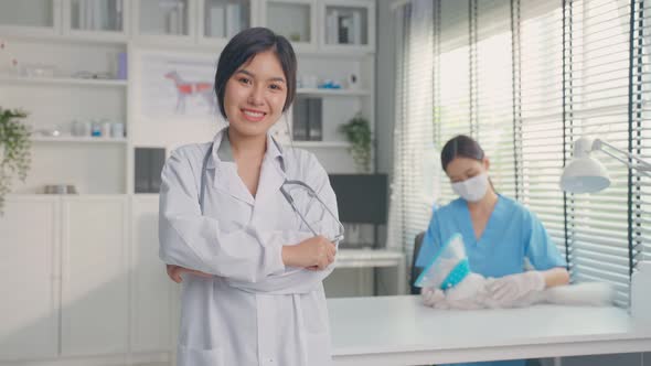 Portrait of beautiful veterinarian woman work in pet office hospital. alt
