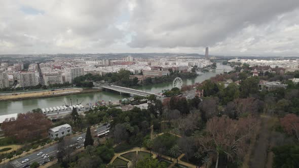 Flyover Maria luisa park towards Guadalquivir river on City center. Seville, Spain