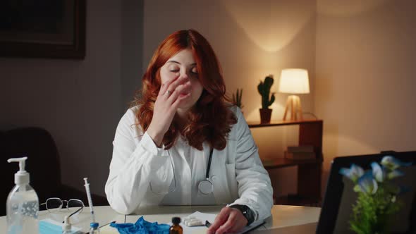 Young Female Doctor Sleeps Tired of the Shift alt