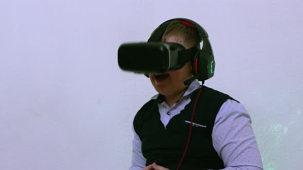 The Boy in the Augmented Reality Helmet Laughs and Opens His Mouth Wide alt