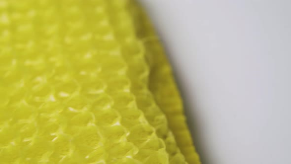 Yellow Bast Wisp for Utensils Cleaning on White Background alt